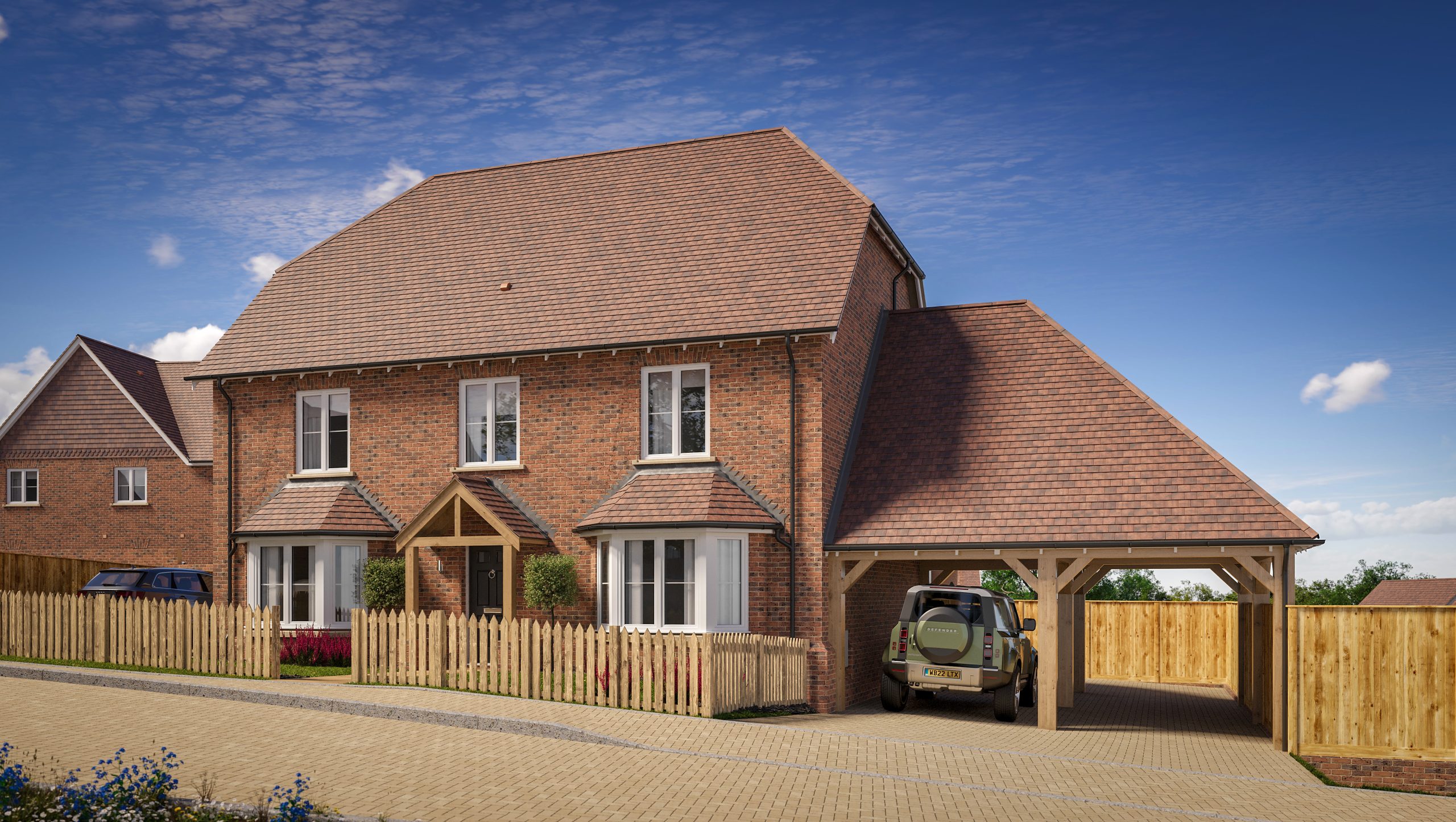 New two-story brick house with a tiled roof, attached double carport, and wooden surrounding the front garden.